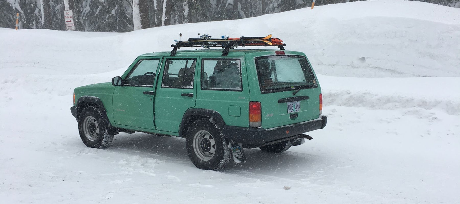 1999 Jeep Cherokee on Snow - Forest Service Green