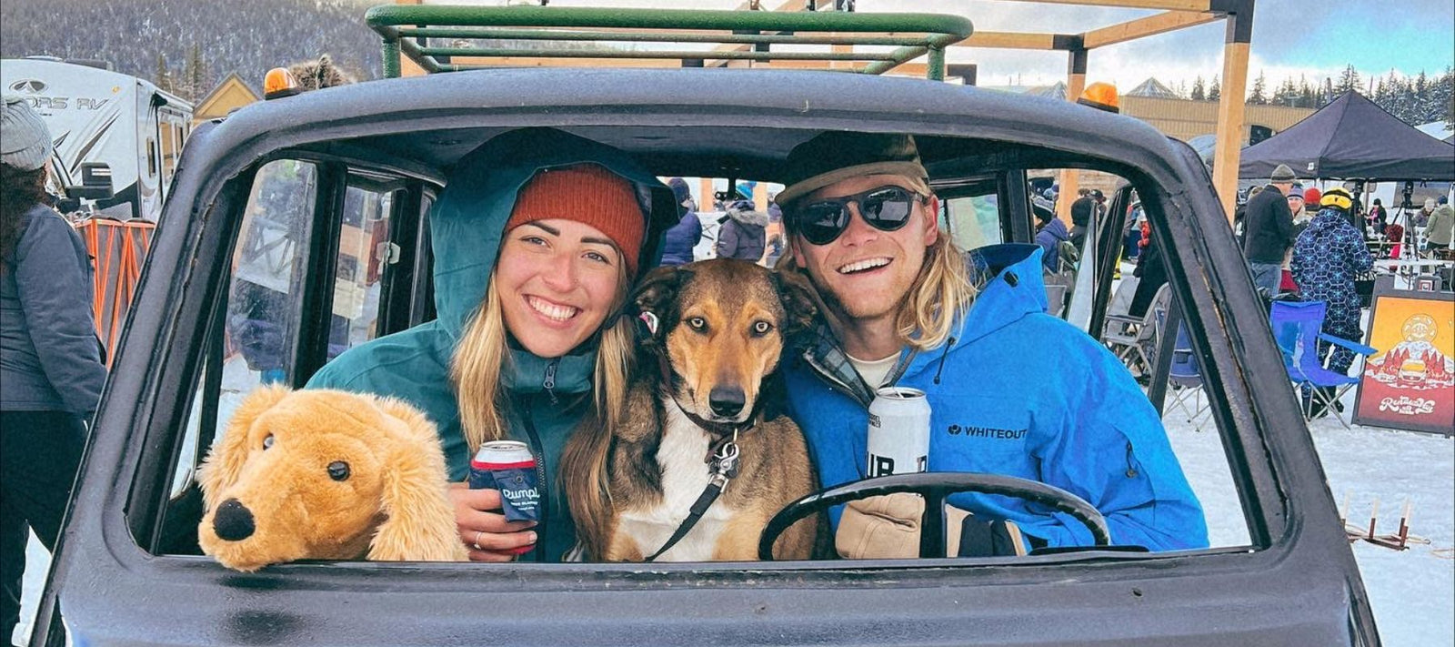 two people and a dog named shasta in a car smiling