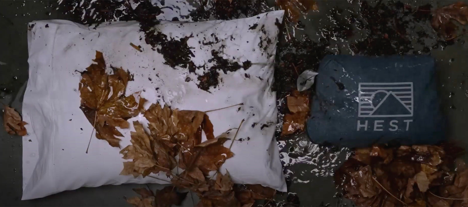 hest pillow vs home standard pillow with leaves and dirt on them side by side.