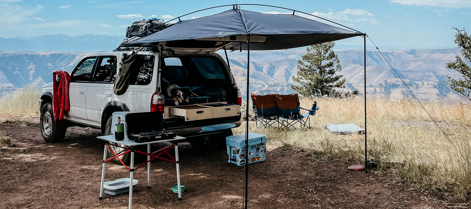 toyota 4runner camping car camping camper on a horizon looking off cliff